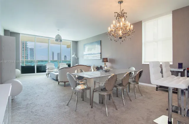 a view of a dining room with furniture window and outside view