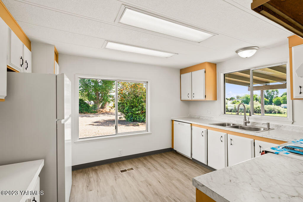 70 Albro Road Sunnyside, WA 98944 - Photo 7 of 33 a kitchen with sink and window