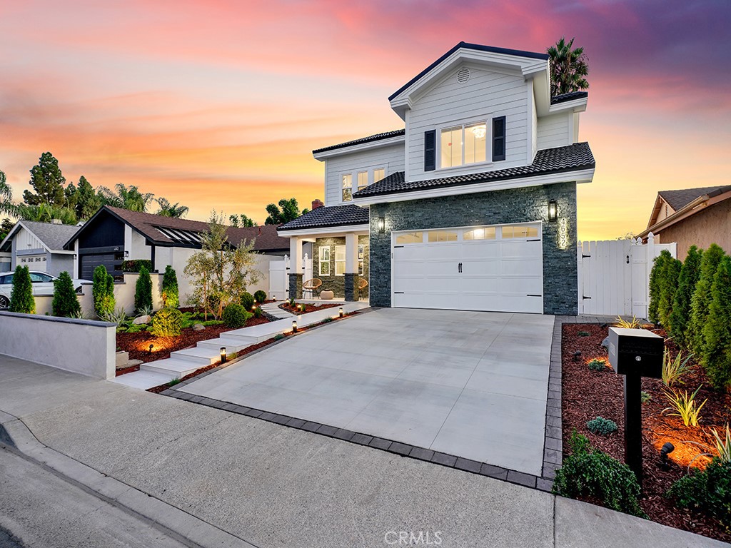 a view of a house with a street