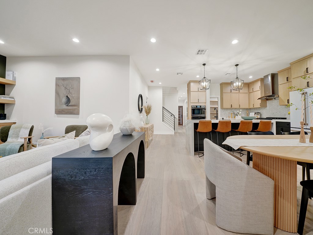 4652 Charnock Drive Irvine, CA 92604 - Photo 11 of 51 a living room with furniture and a table