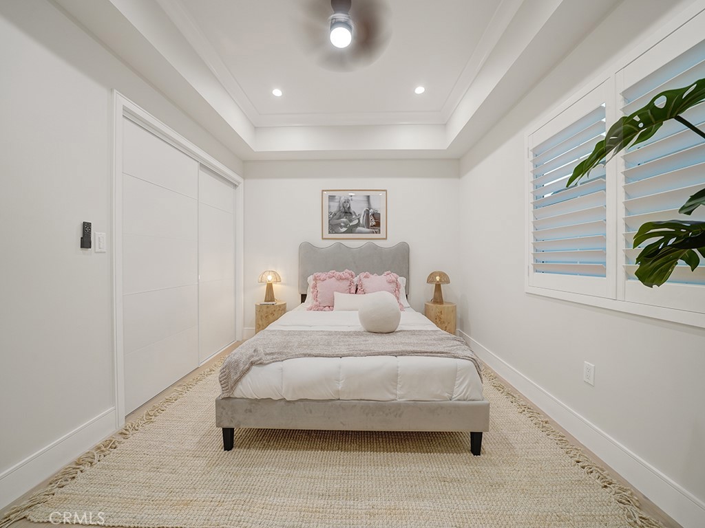 4652 Charnock Drive Irvine, CA 92604 - Photo 23 of 51 a bedroom with a bed and a window