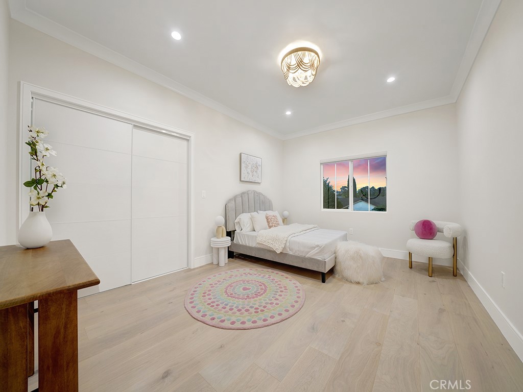 4652 Charnock Drive Irvine, CA 92604 - Photo 26 of 51 a living room with furniture and a potted plant