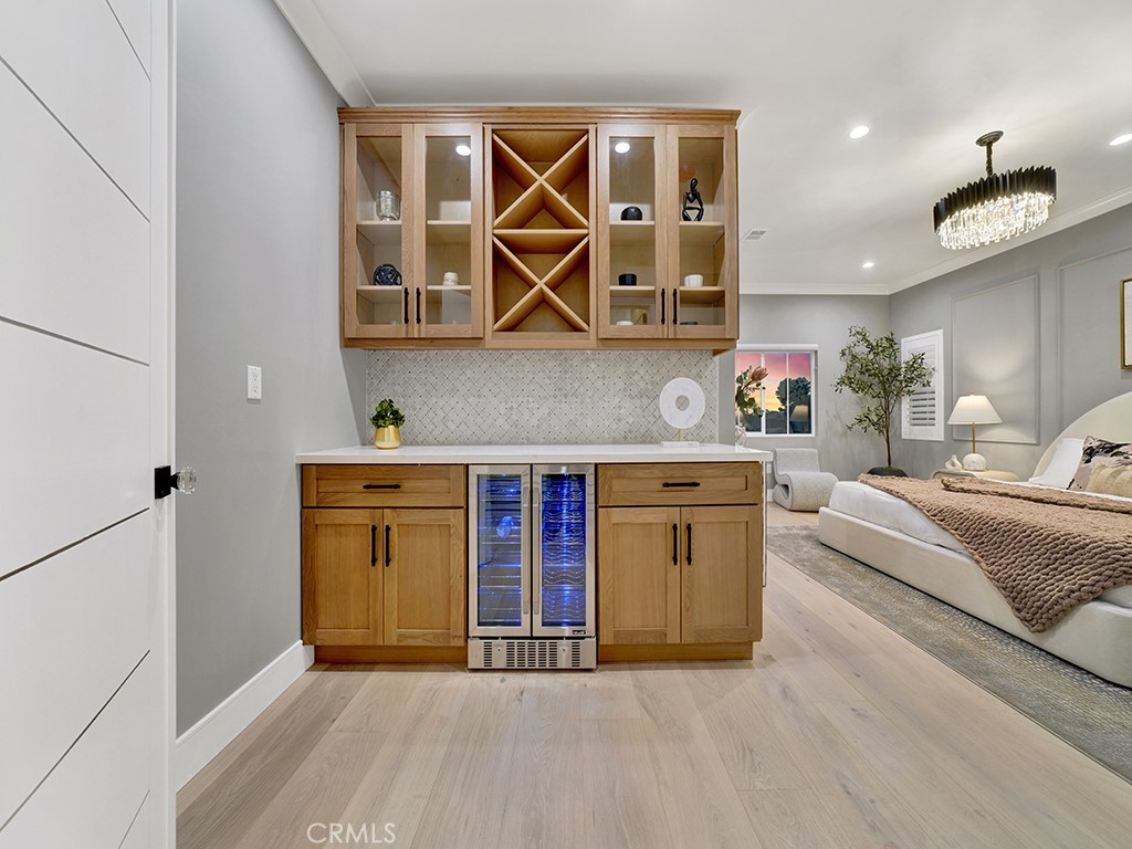 4652 Charnock Drive Irvine, CA 92604 - Photo 35 of 51 a kitchen with stainless steel appliances granite countertop a stove and a sink