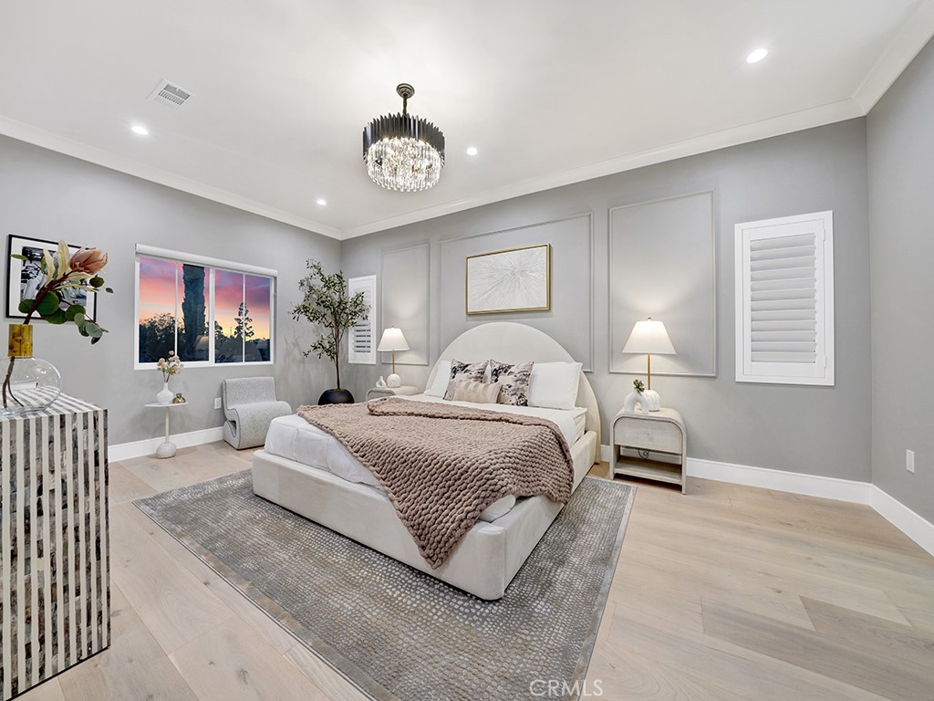 4652 Charnock Drive Irvine, CA 92604 - Photo 36 of 51 a spacious bedroom with a bed and window