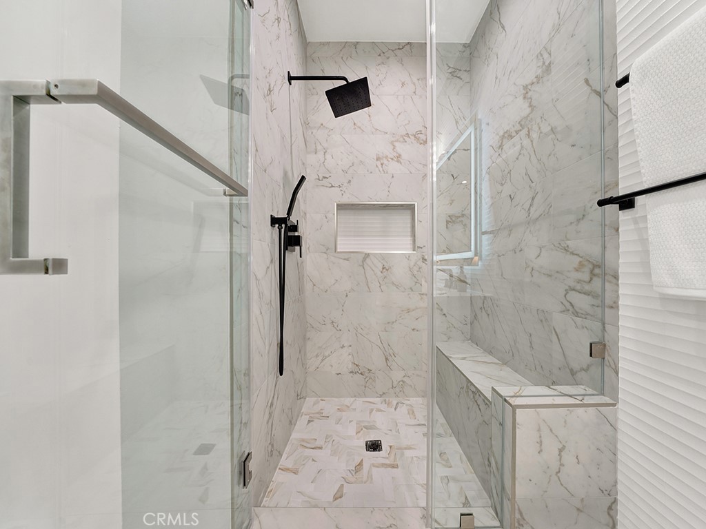 4652 Charnock Drive Irvine, CA 92604 - Photo 43 of 51 a bathroom with a shower