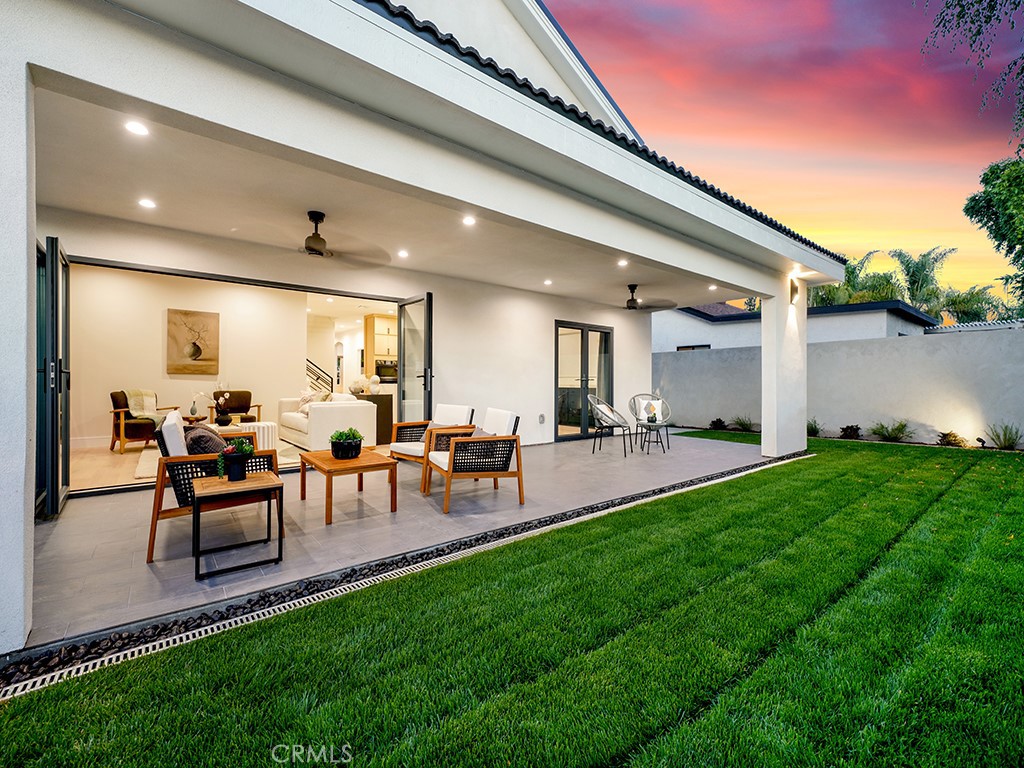 4652 Charnock Drive Irvine, CA 92604 - Photo 47 of 51 a group of people sitting in the middle of a yard