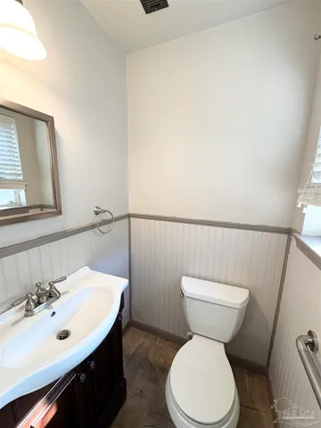 an empty room with a empty space and windows