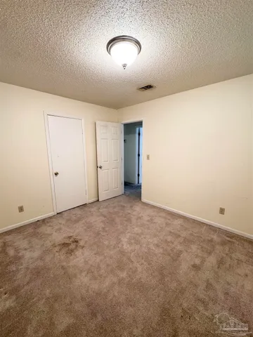 a bathroom with a sink toilet and a mirror