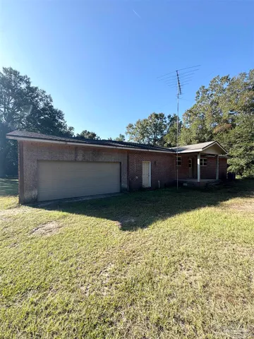 a view of an ocean and a yard