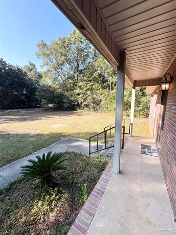 a view of a room with mountain and ocean view