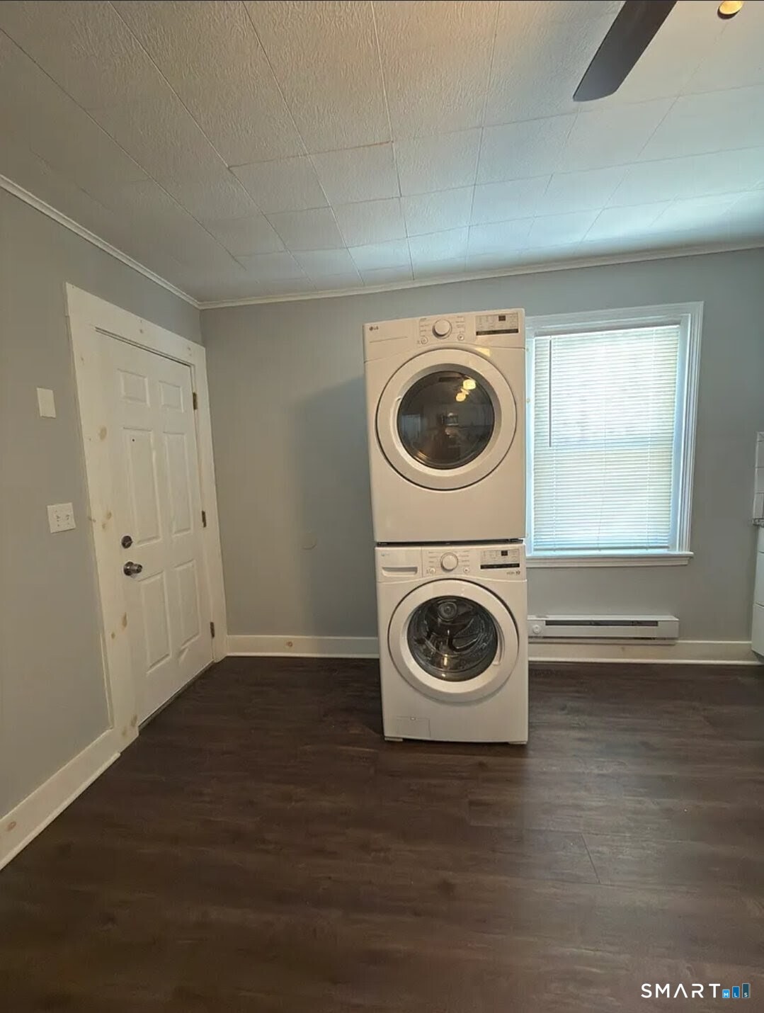 1163 West Main Street Waterbury, CT 06708 - Photo 4 of 11 a view of a washer and dryer in a room