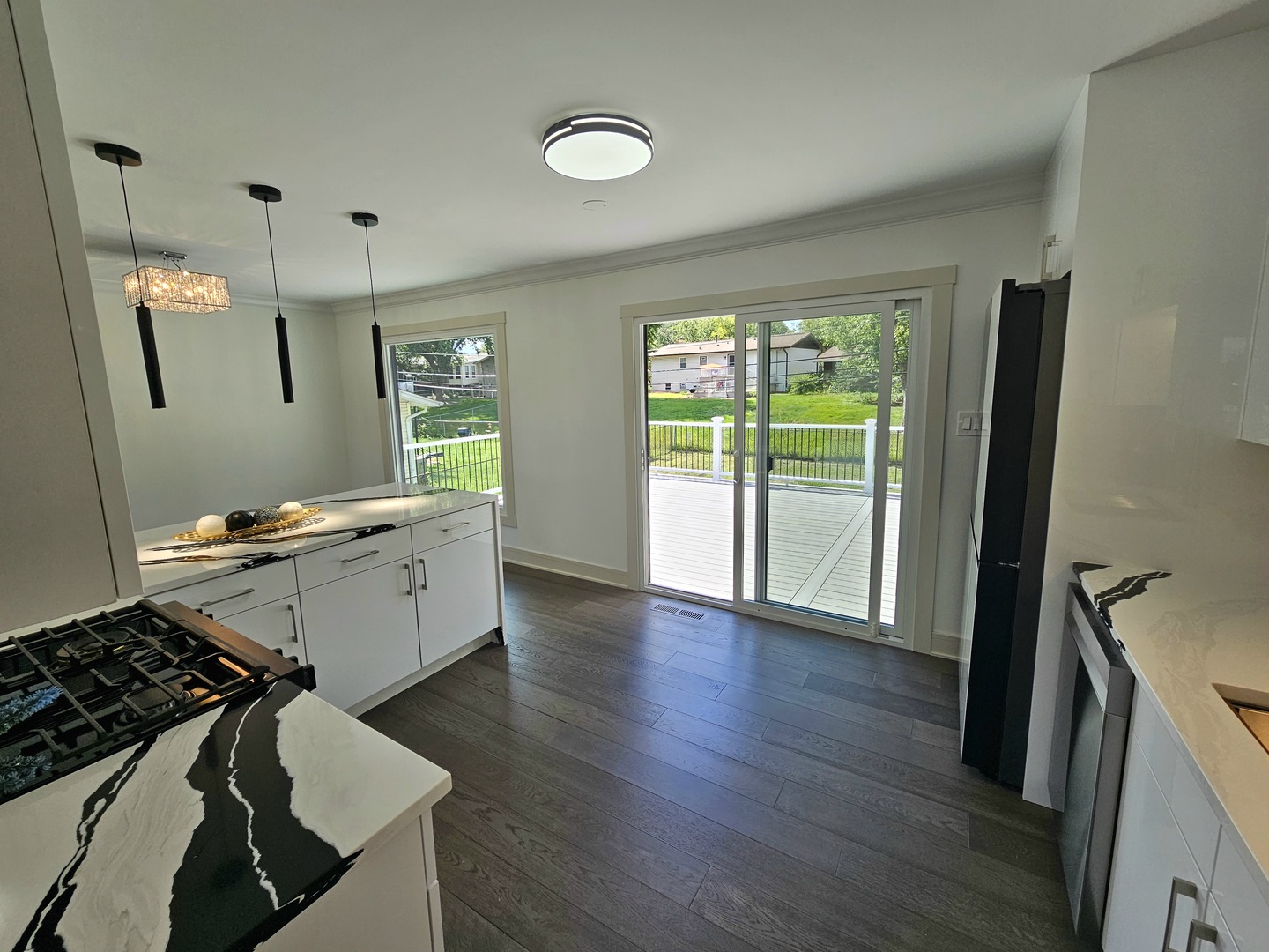 6230 Boca Rio Drive Oak Forest, IL 60452 - Photo 13 of 29 a view of a kitchen with a sink wooden floor and a window
