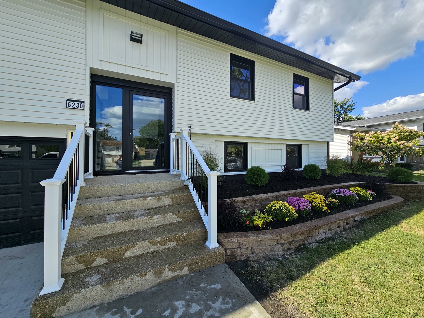 6230 Boca Rio Drive Oak Forest, IL 60452 - Photo 2 of 29 a front view of a house with a yard