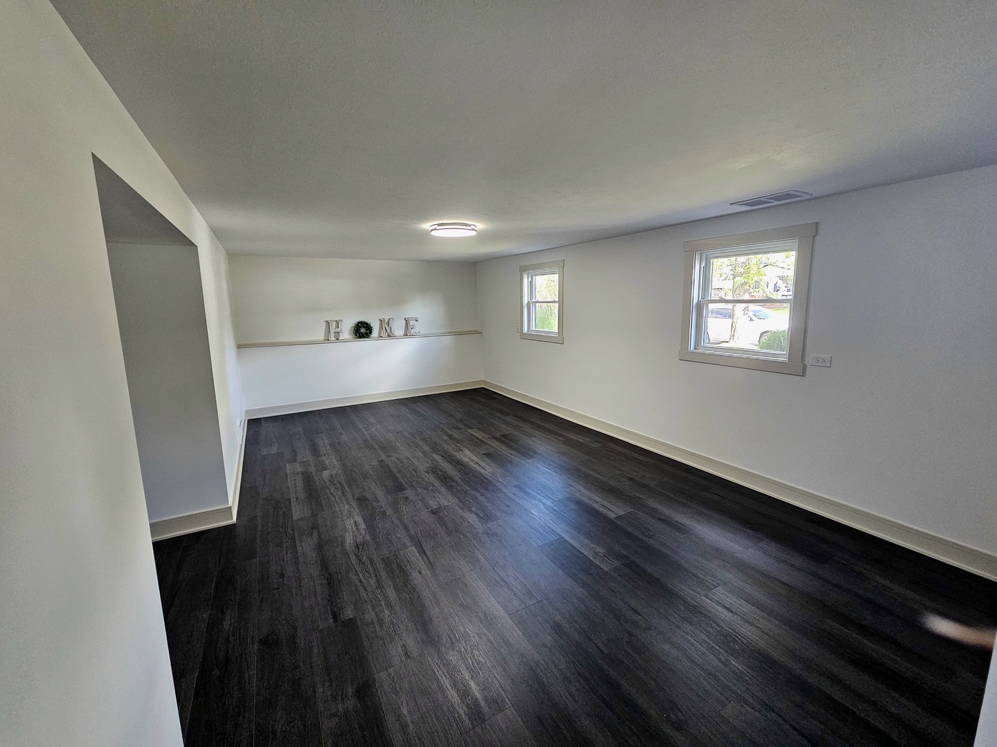 6230 Boca Rio Drive Oak Forest, IL 60452 - Photo 23 of 29 an empty room with wooden floor and windows