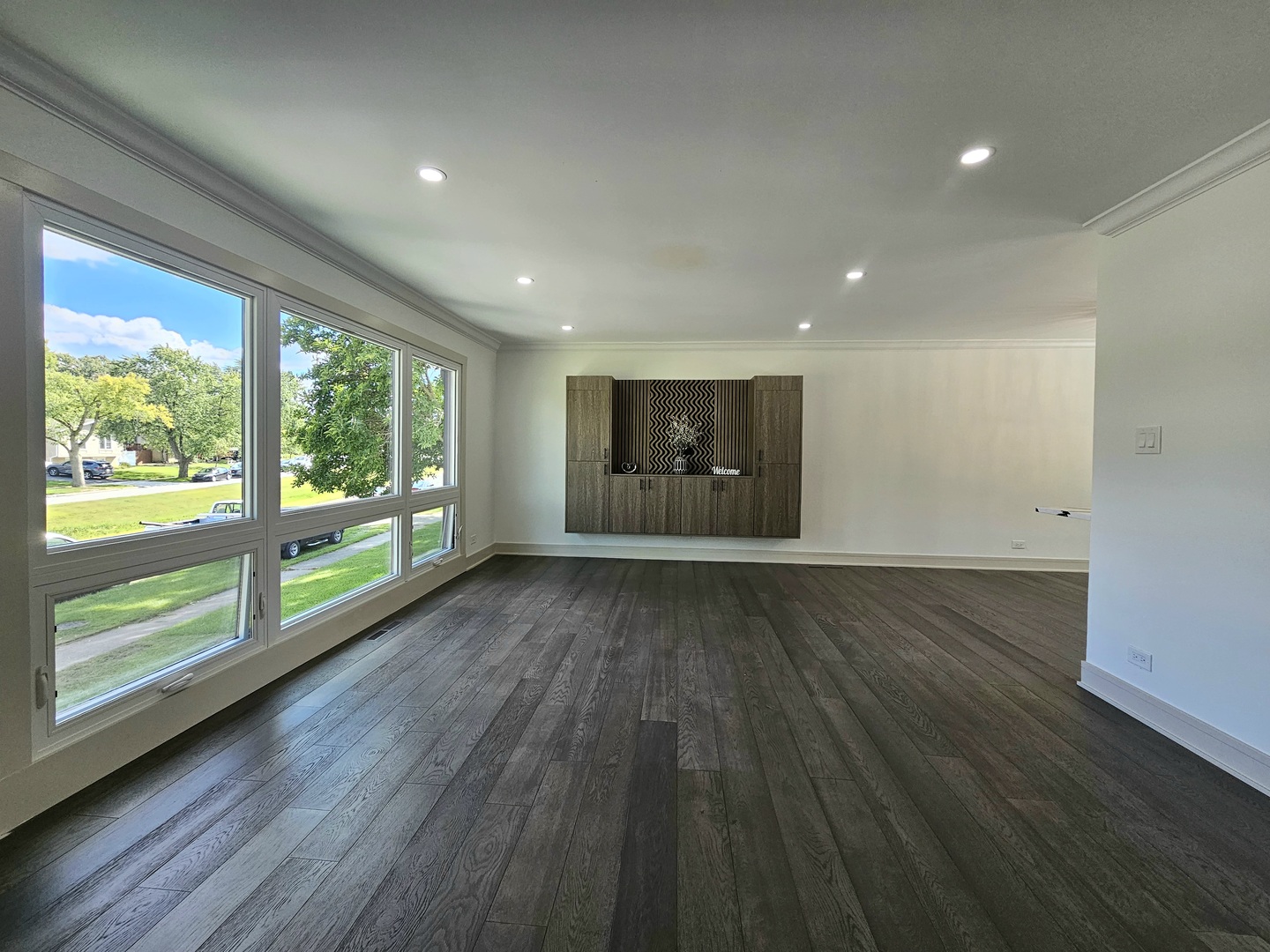 6230 Boca Rio Drive Oak Forest, IL 60452 - Photo 5 of 29 an empty room with wooden floor and windows