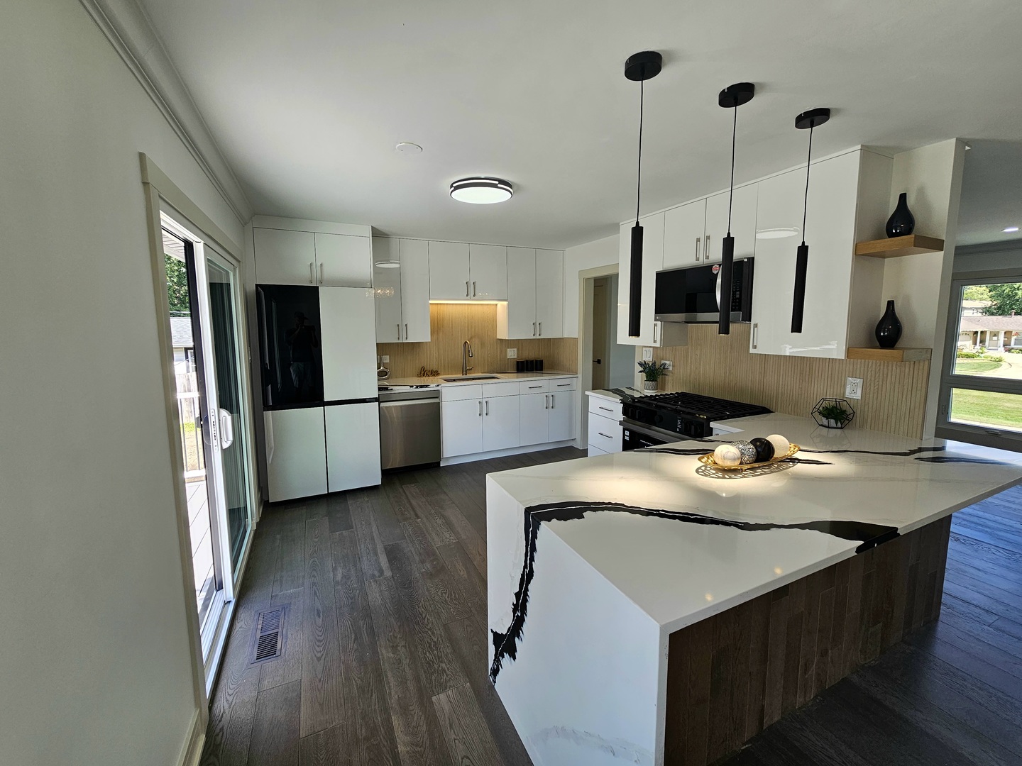 6230 Boca Rio Drive Oak Forest, IL 60452 - Photo 10 of 29 a kitchen with stainless steel appliances a stove sink and microwave