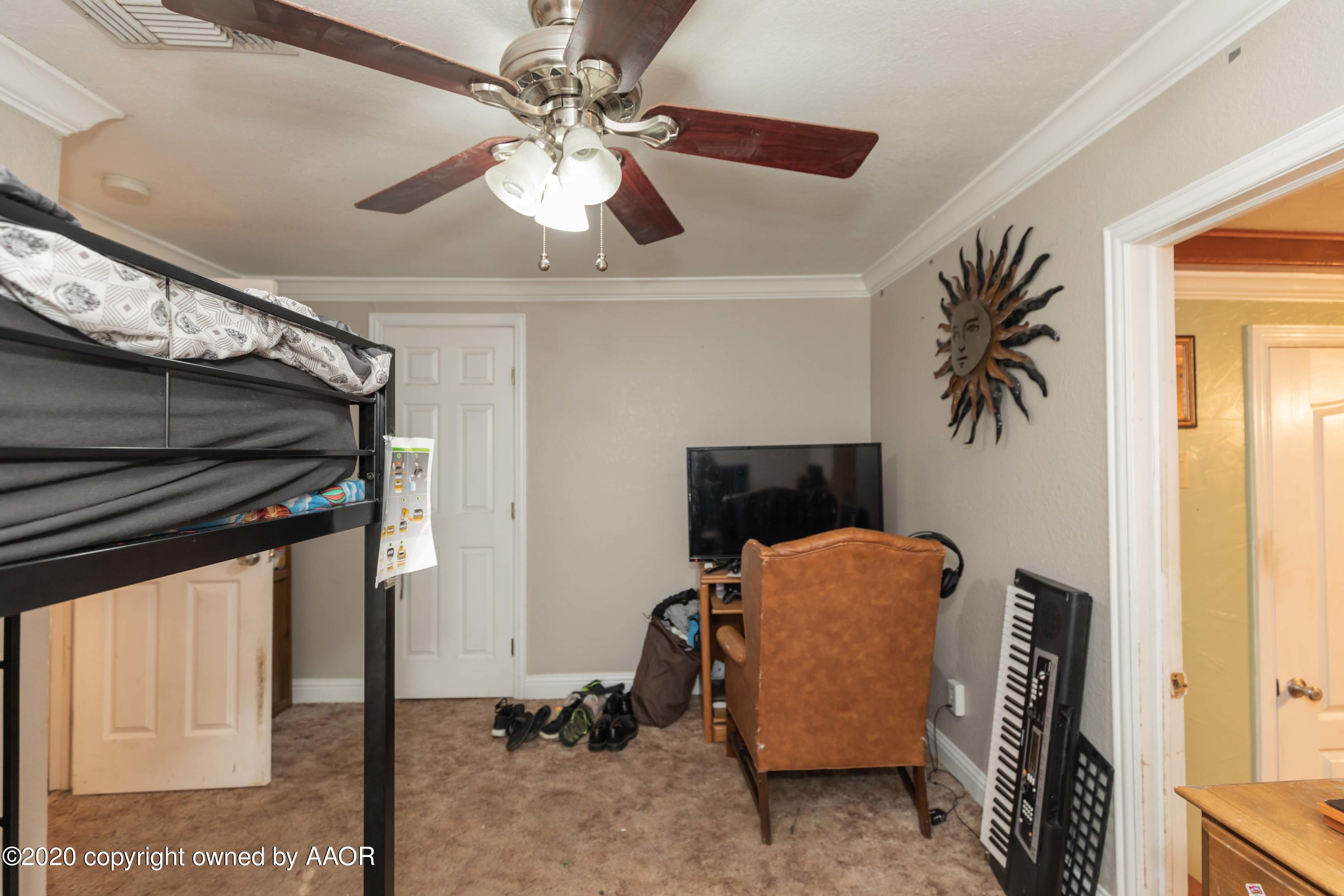 3505 South Tyler Street Amarillo, TX 79110 - Photo 20 of 29 a room with furniture and a window