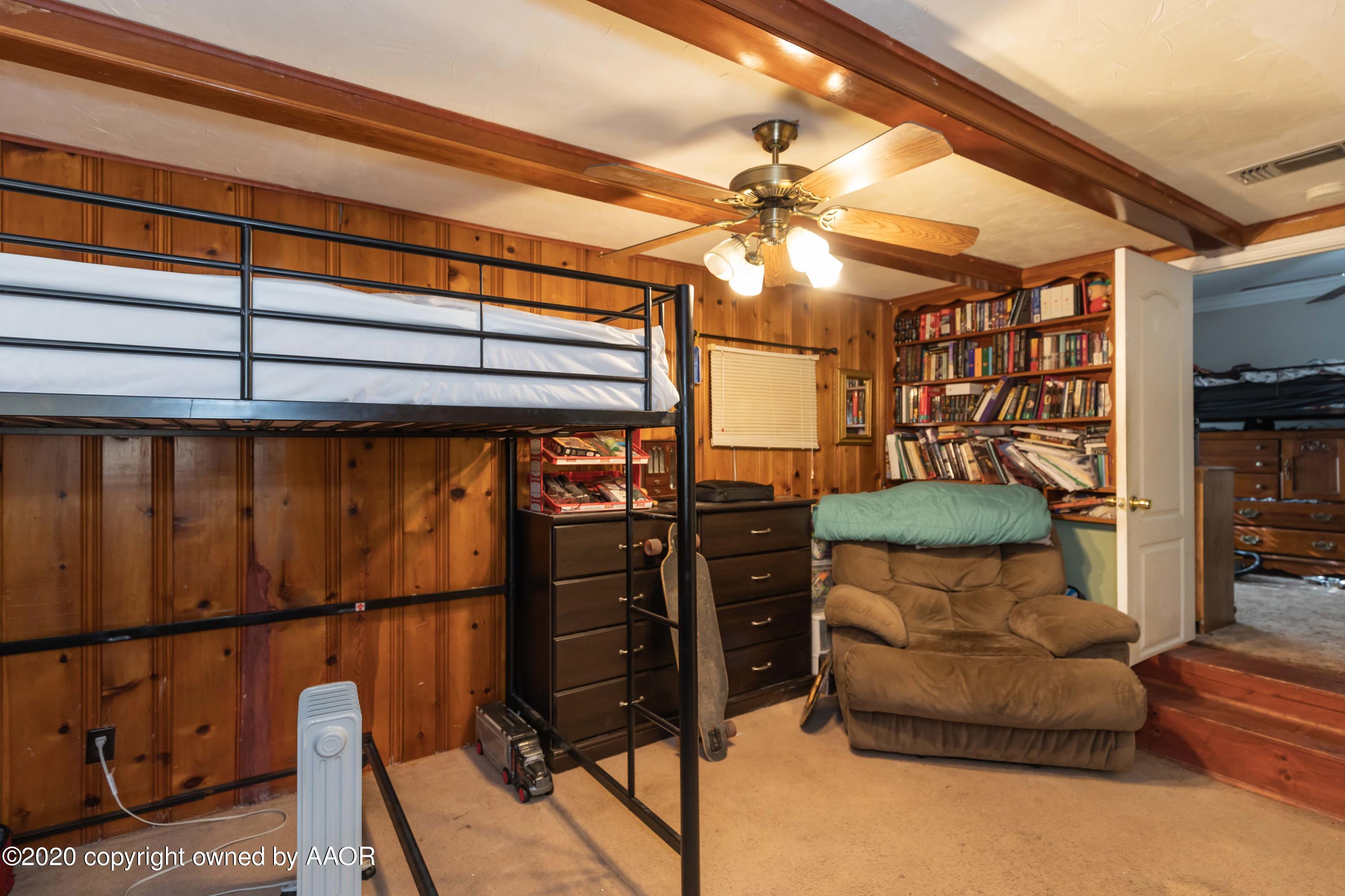 3505 South Tyler Street Amarillo, TX 79110 - Photo 25 of 29 a view of a livingroom with furniture and a ceiling fan