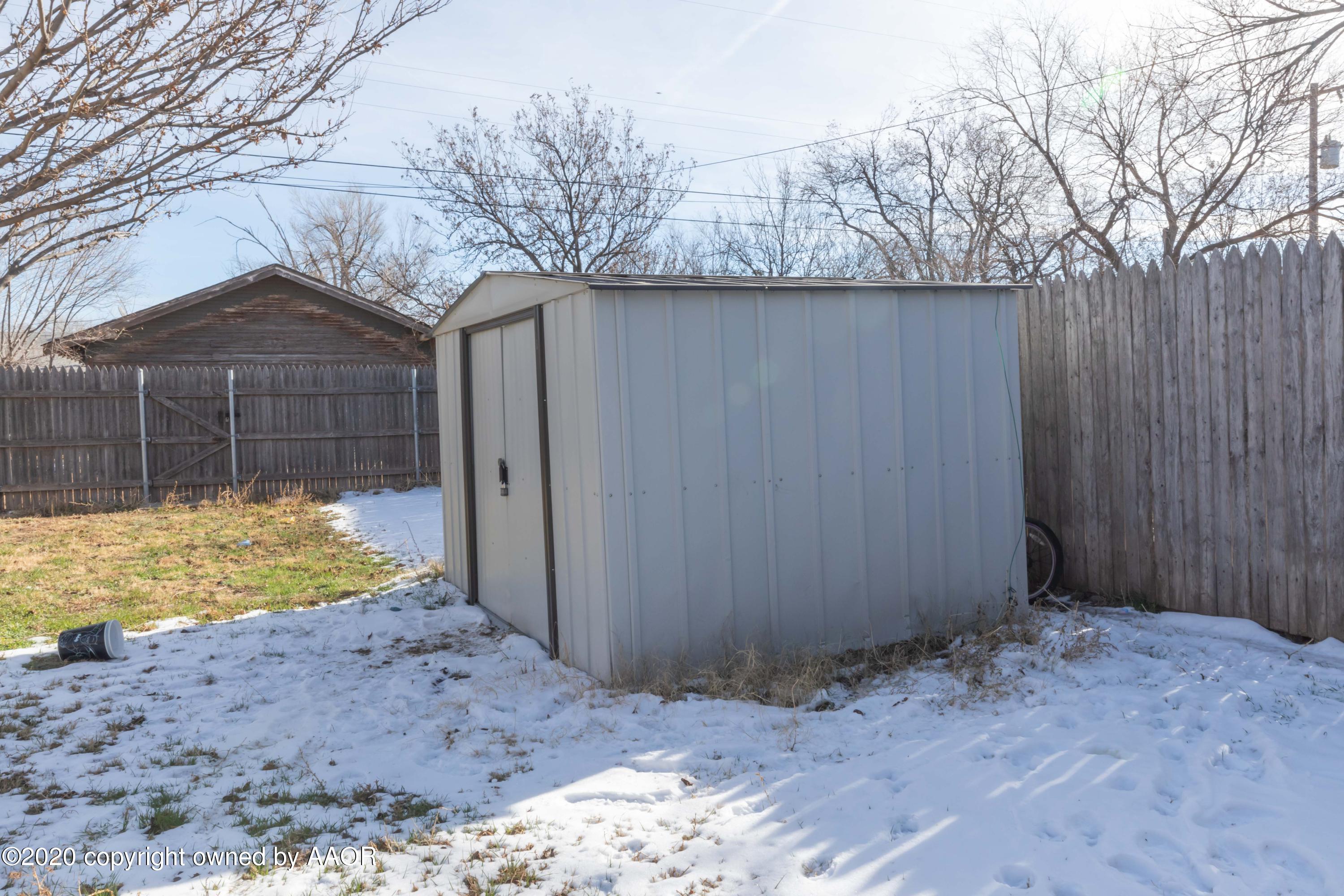 3505 South Tyler Street Amarillo, TX 79110 - Photo 26 of 29 a view of a house with a yard covered in snow