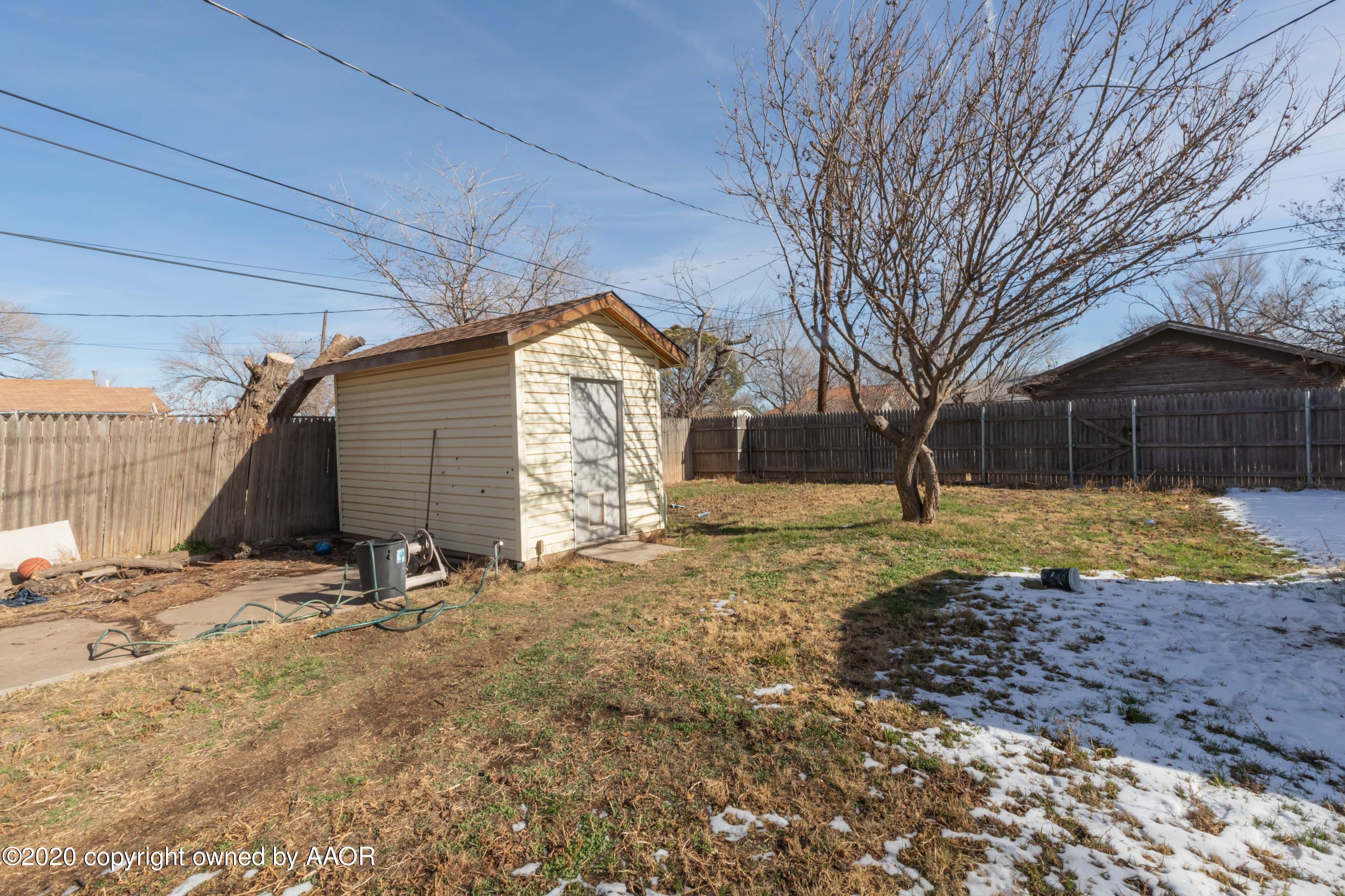 3505 South Tyler Street Amarillo, TX 79110 - Photo 28 of 29 a view of a house with a yard