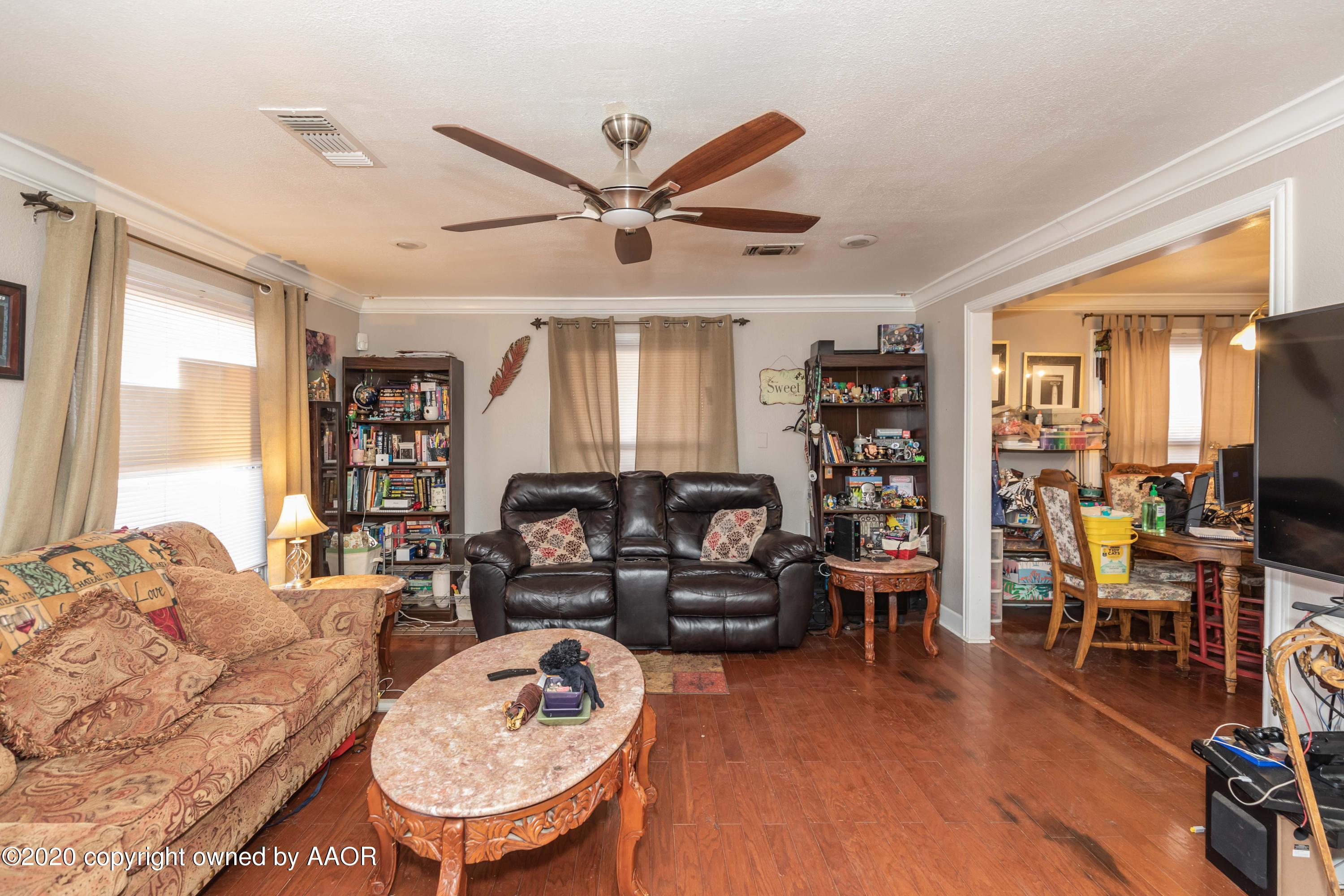 3505 South Tyler Street Amarillo, TX 79110 - Photo 6 of 29 a living room with furniture and a large window