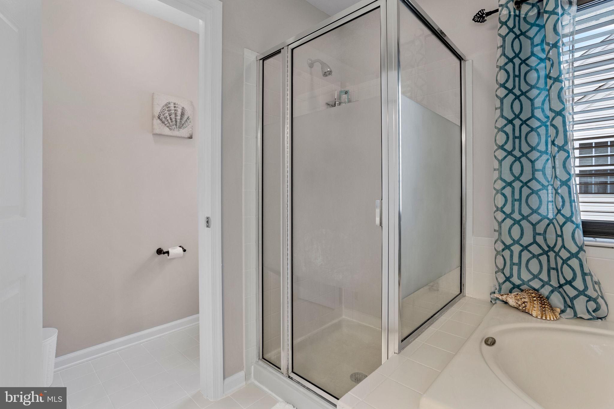 233 Windsor Drive Swedesboro, NJ 08085 - Photo 27 of 46 a bathroom with a bathtub and shower