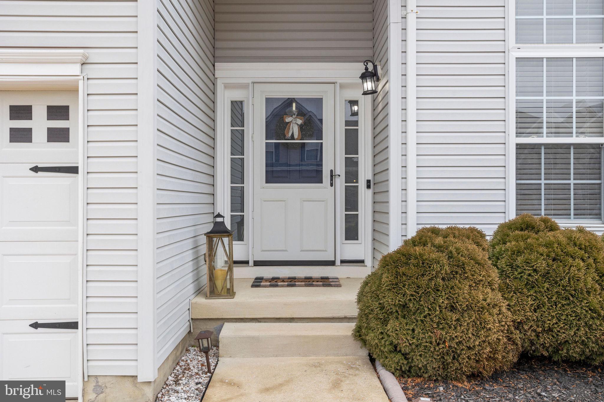 233 Windsor Drive Swedesboro, NJ 08085 - Photo 3 of 46 a view of a entryway door front of house