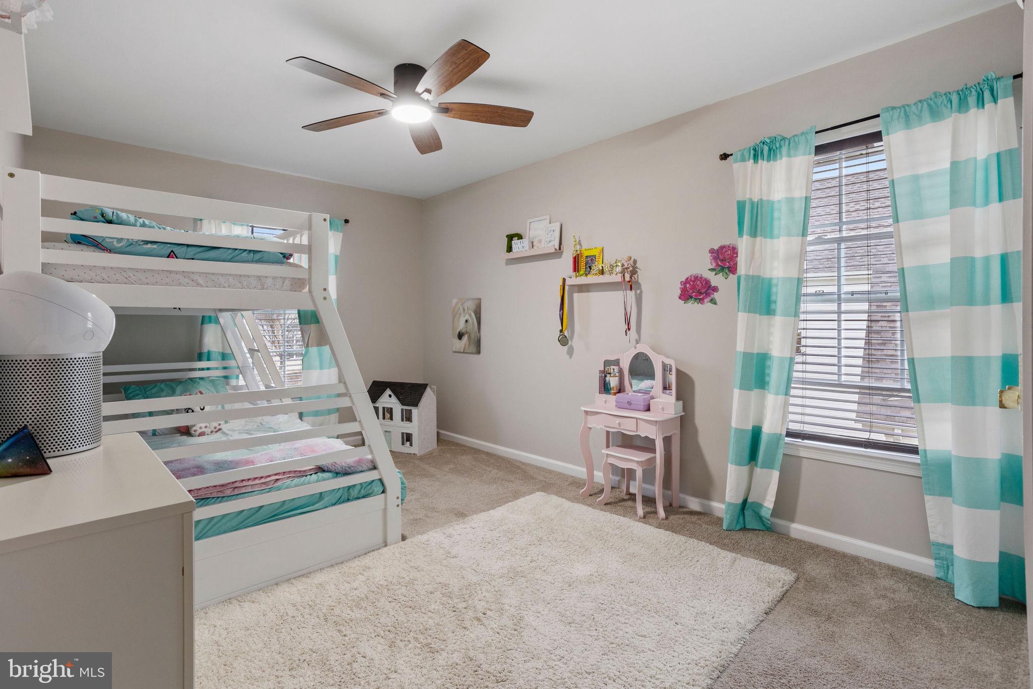 233 Windsor Drive Swedesboro, NJ 08085 - Photo 31 of 46 a living room with furniture and a chandelier