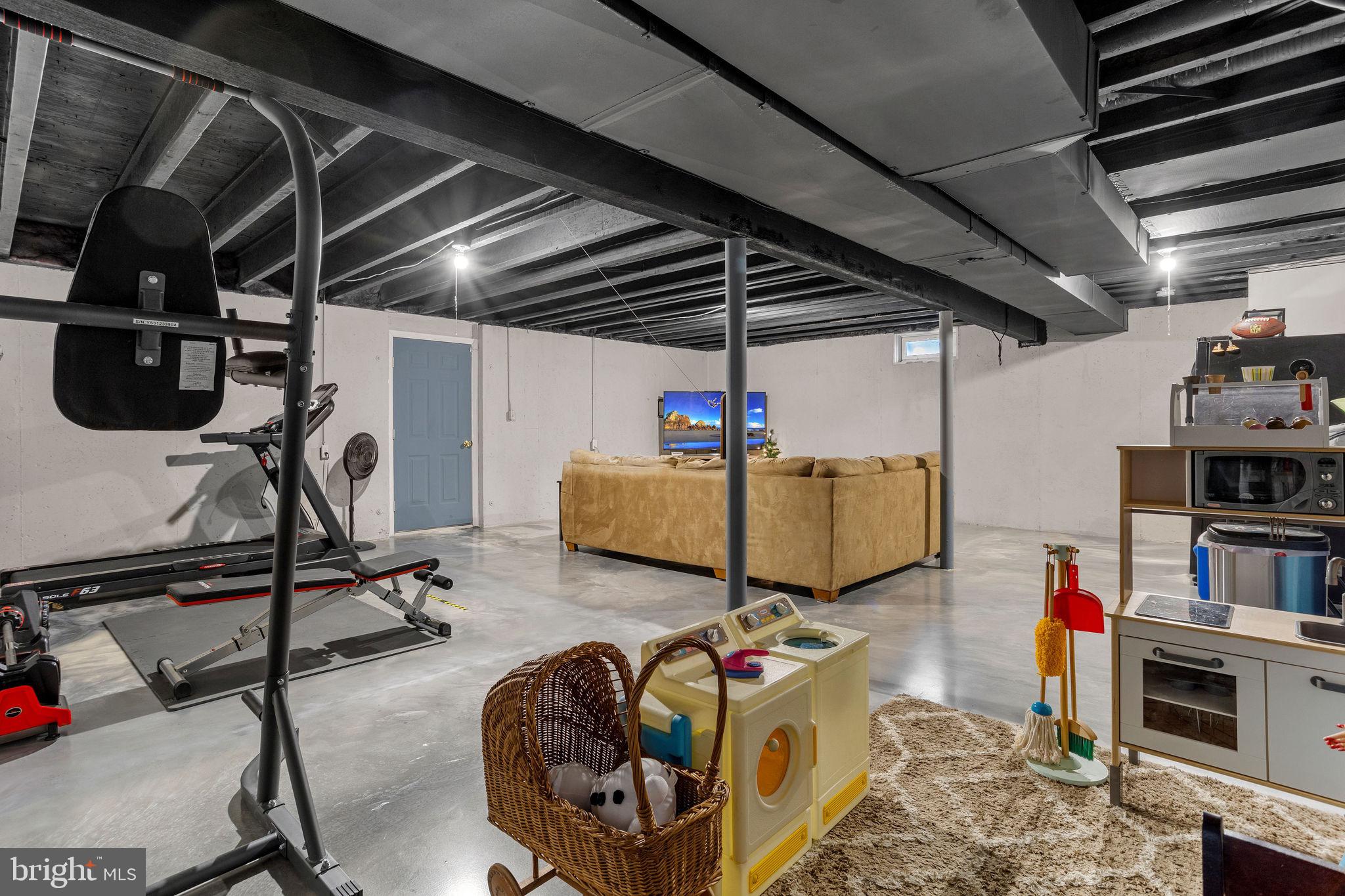 233 Windsor Drive Swedesboro, NJ 08085 - Photo 36 of 46 a room with gym equipment