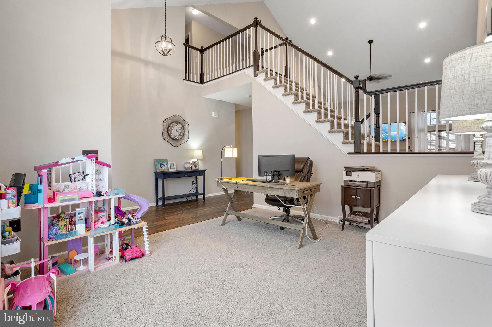 233 Windsor Drive Swedesboro, NJ 08085 - Photo 6 of 46 a bedroom with furniture and a chandelier