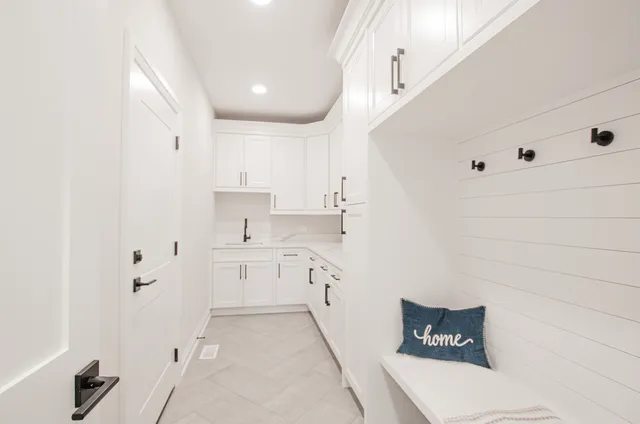 a spacious bathroom with a sink a toilet and shower