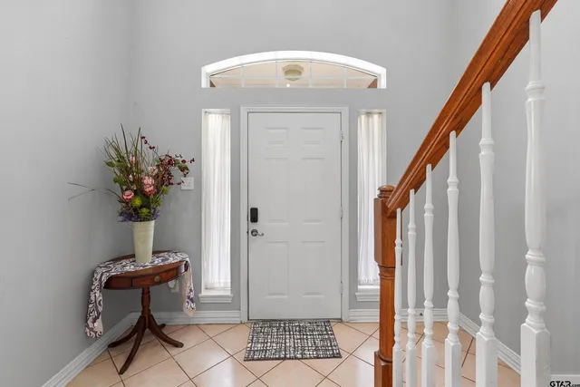 a view of an entryway with a potted plant