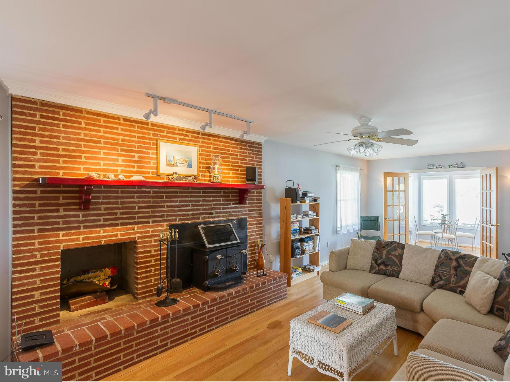 7636 Brown Road Pasadena, MD 21122 - Photo 11 of 30 Living Room with Woodstove