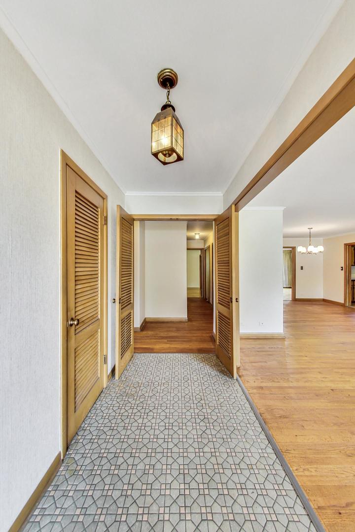 1906 Manor Lane Park Ridge, IL 60068 - Photo 2 of 40 a view of empty room with wooden floor