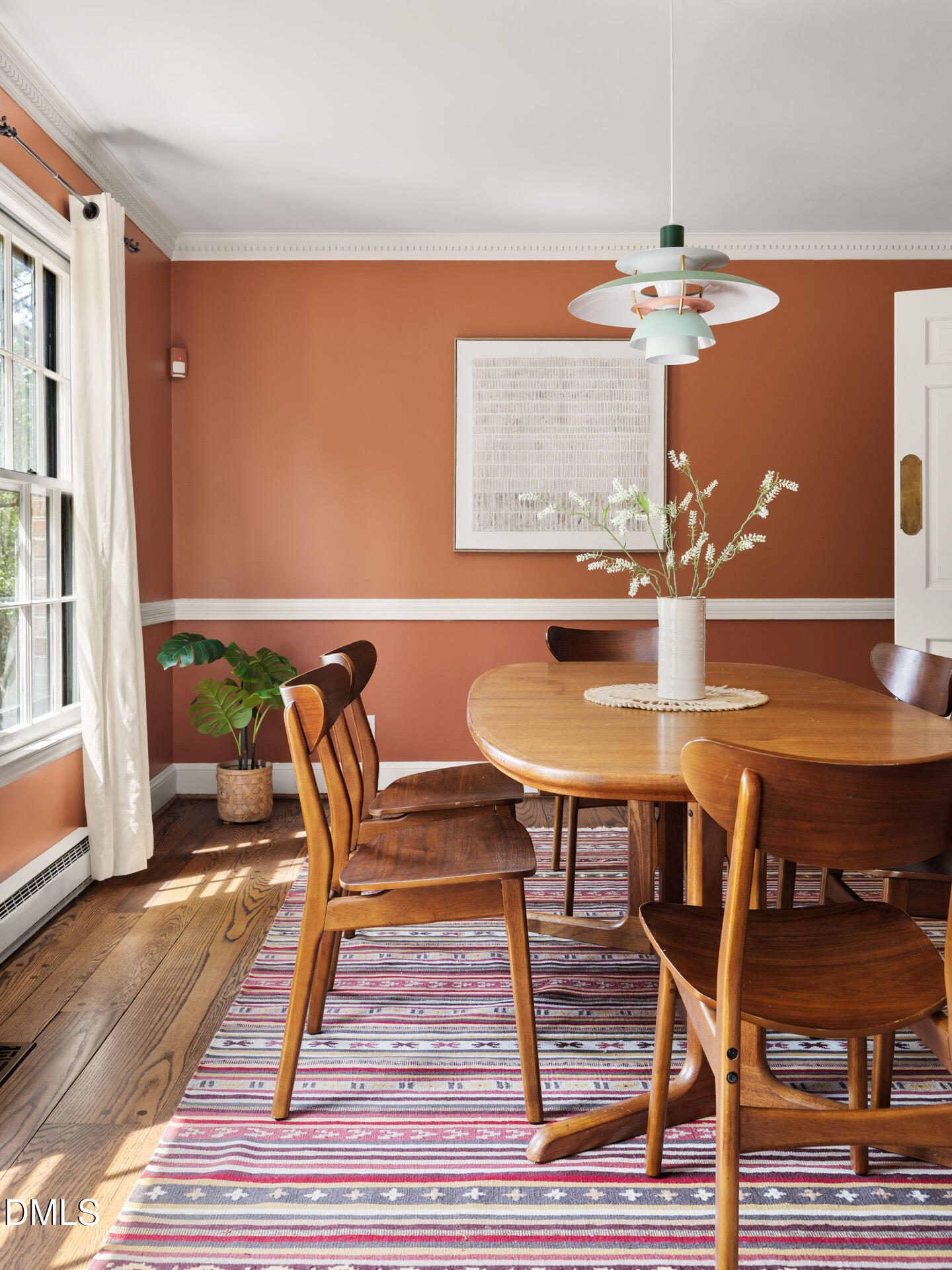 1706 Wallace Street Durham, NC 27707 - Photo 17 of 55 a dining room view with a table and chairs