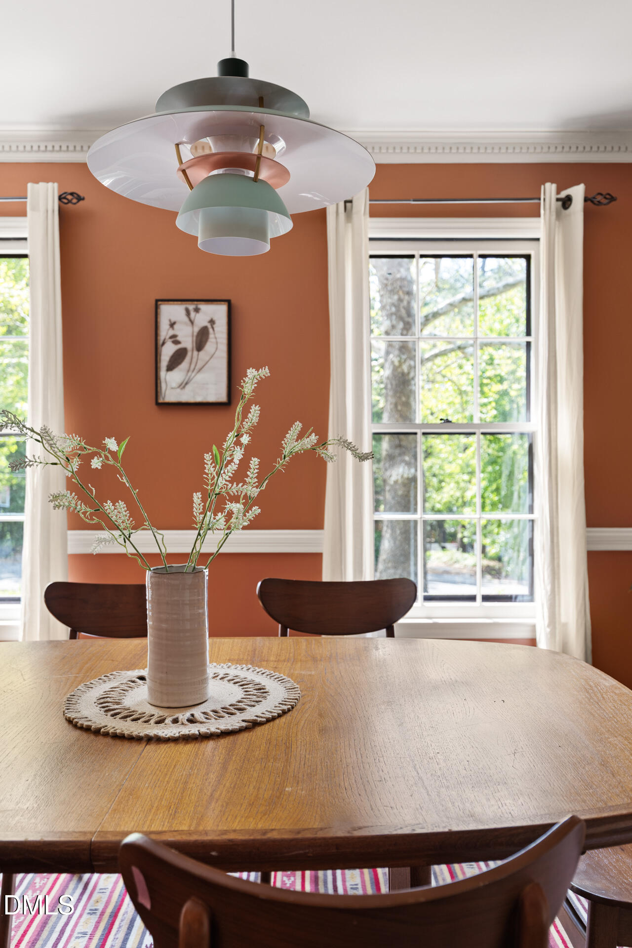 1706 Wallace Street Durham, NC 27707 - Photo 18 of 55 a view of a dining room with a table and chairs