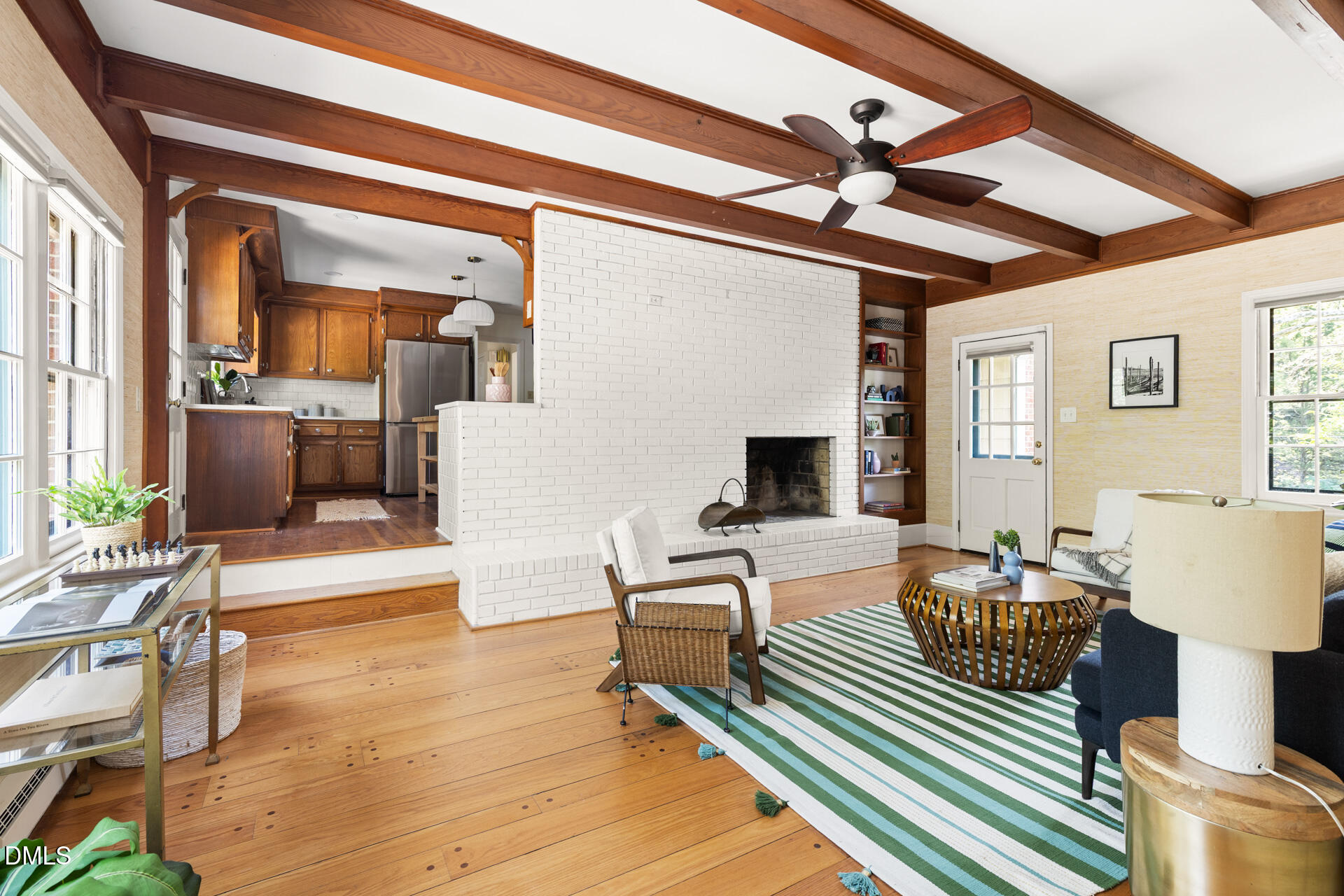 1706 Wallace Street Durham, NC 27707 - Photo 22 of 55 a living room with furniture and a wooden floor