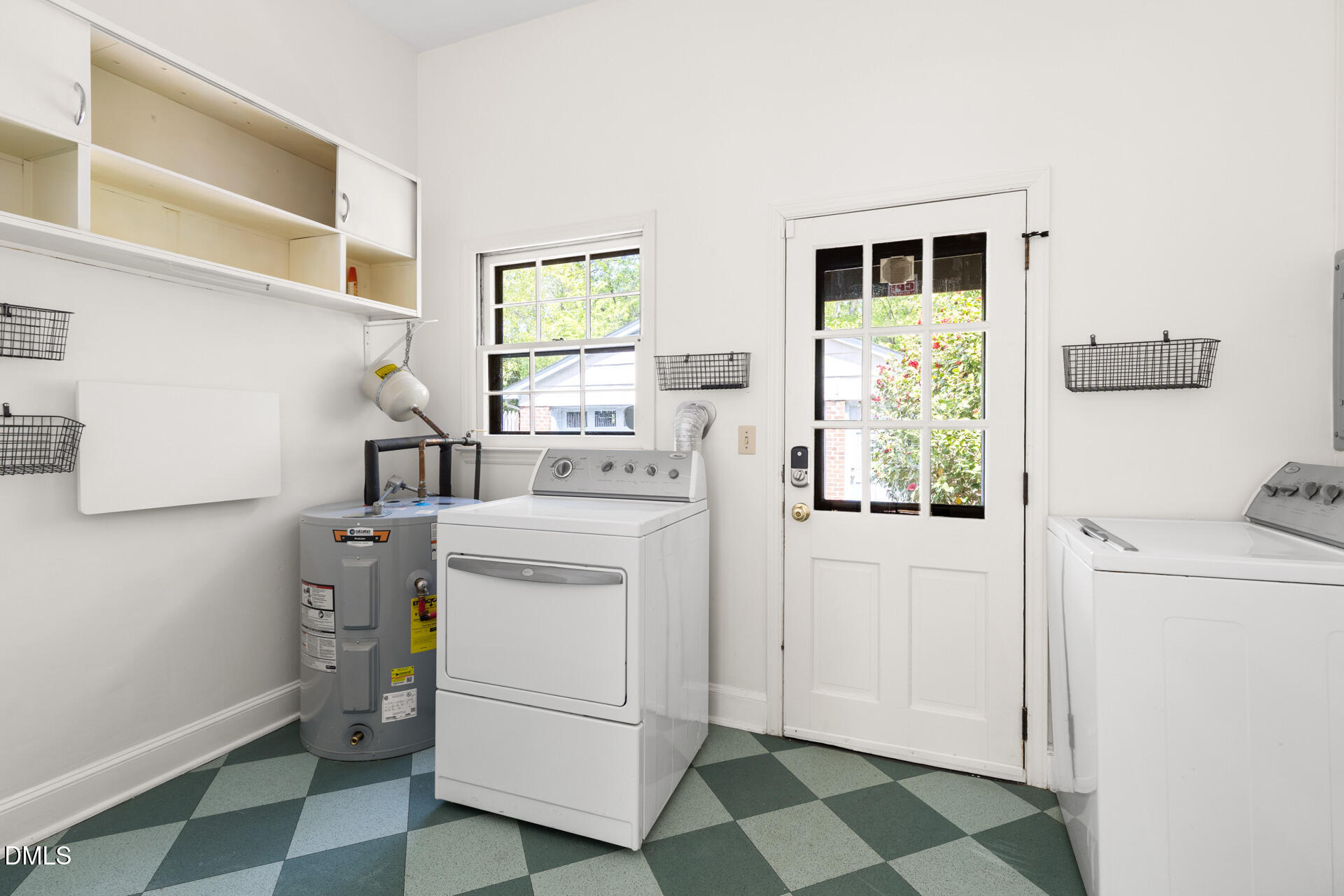 1706 Wallace Street Durham, NC 27707 - Photo 24 of 55 a utility room with dryer and washer