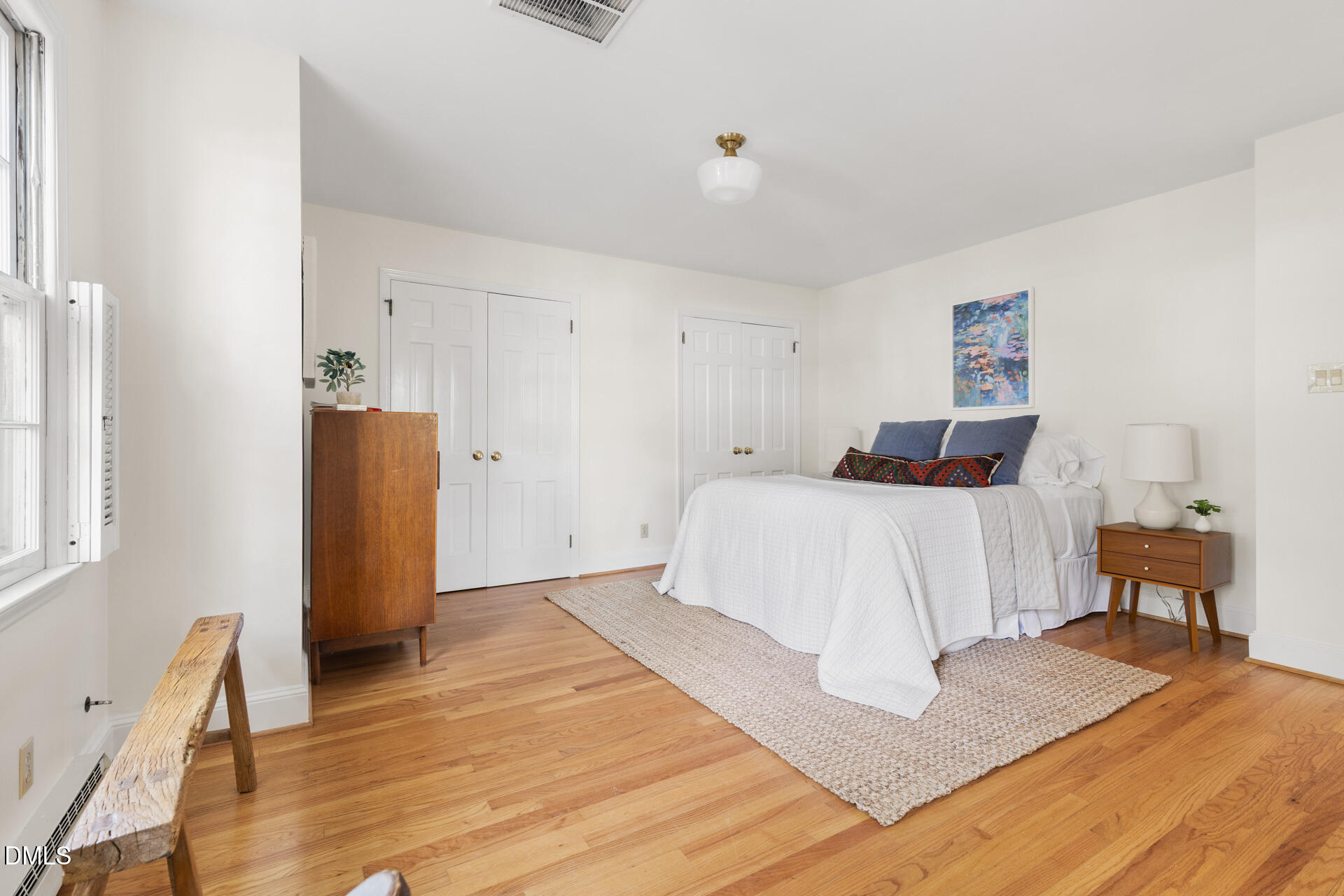 1706 Wallace Street Durham, NC 27707 - Photo 33 of 55 a bedroom with a bed and a table