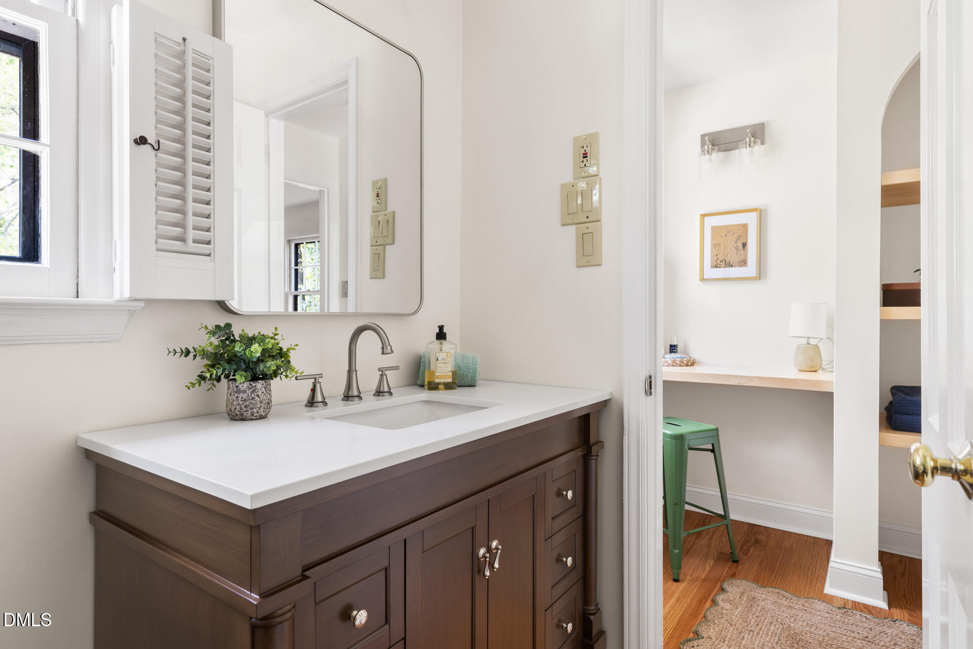 1706 Wallace Street Durham, NC 27707 - Photo 38 of 55 a bathroom with a sink and a mirror