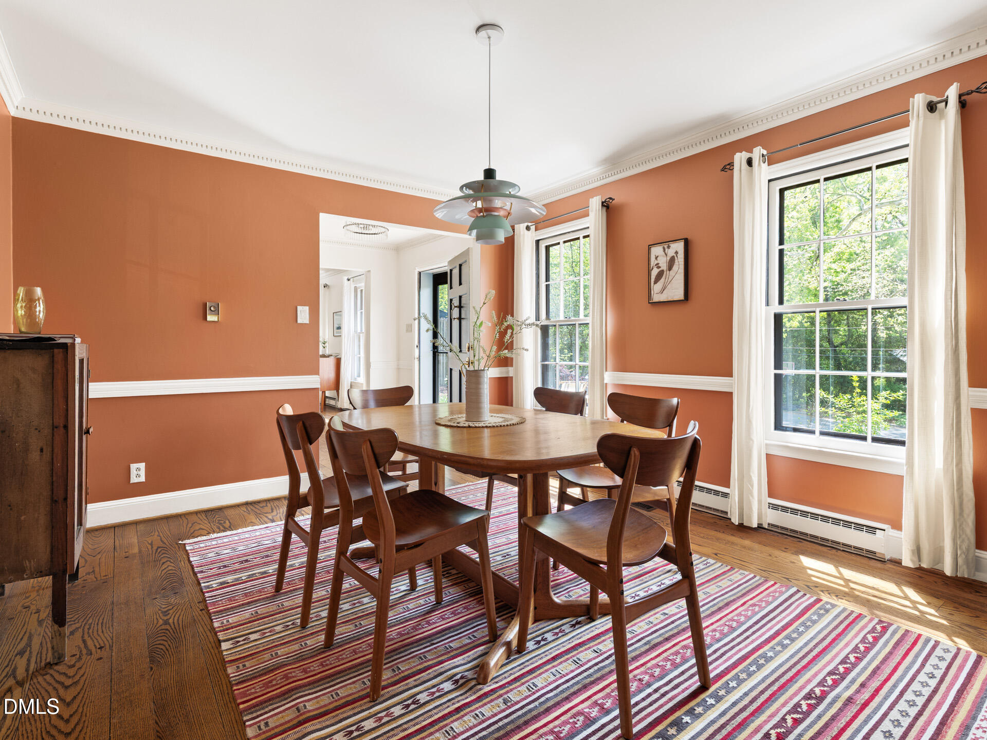 1706 Wallace Street Durham, NC 27707 - Photo 3 of 55 a view of a dining room with furniture window and wooden floor