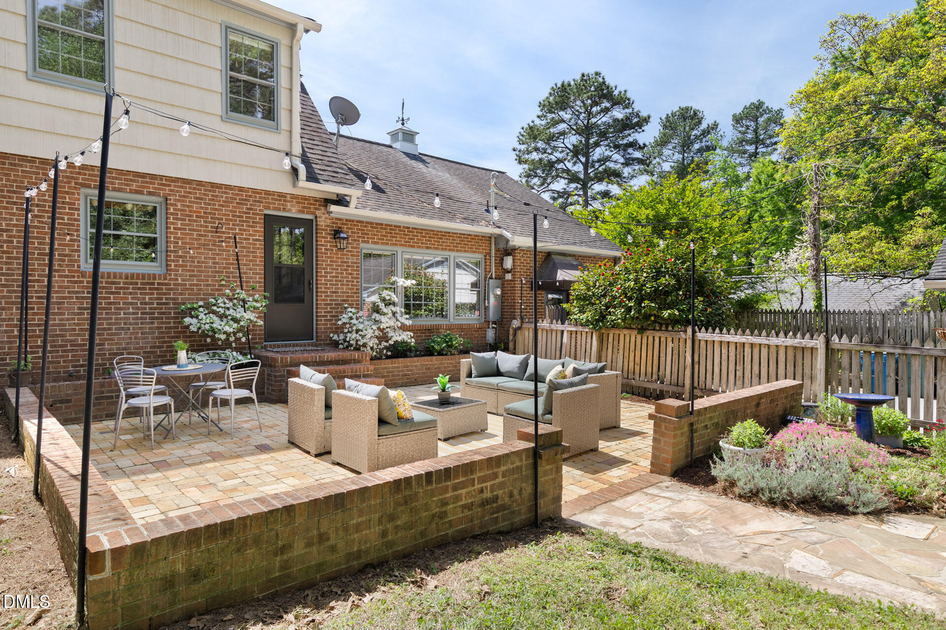 1706 Wallace Street Durham, NC 27707 - Photo 45 of 55 a view of a patio with couches table and chairs and potted plants