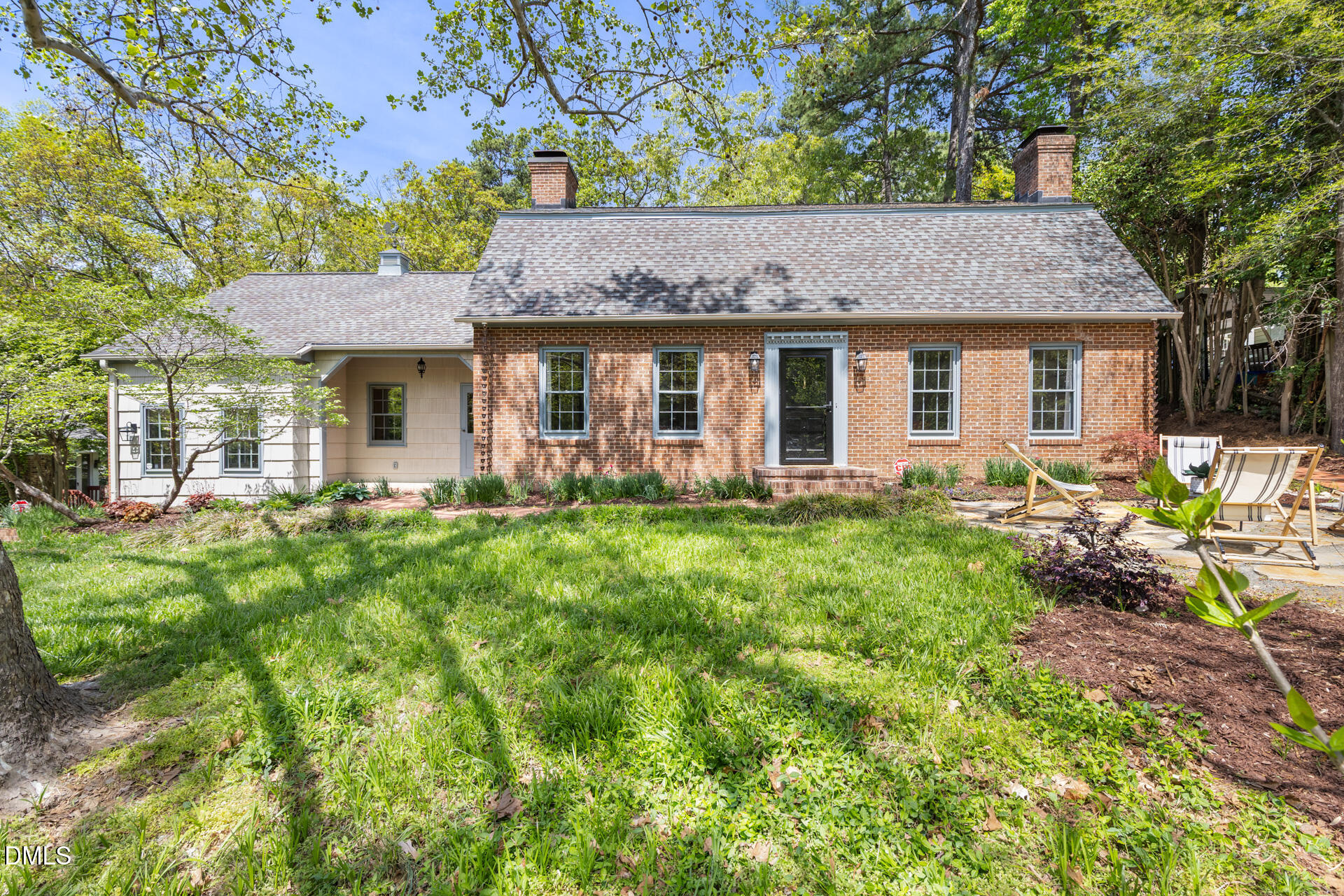 1706 Wallace Street Durham, NC 27707 - Photo 7 of 55 a front view of a house with garden