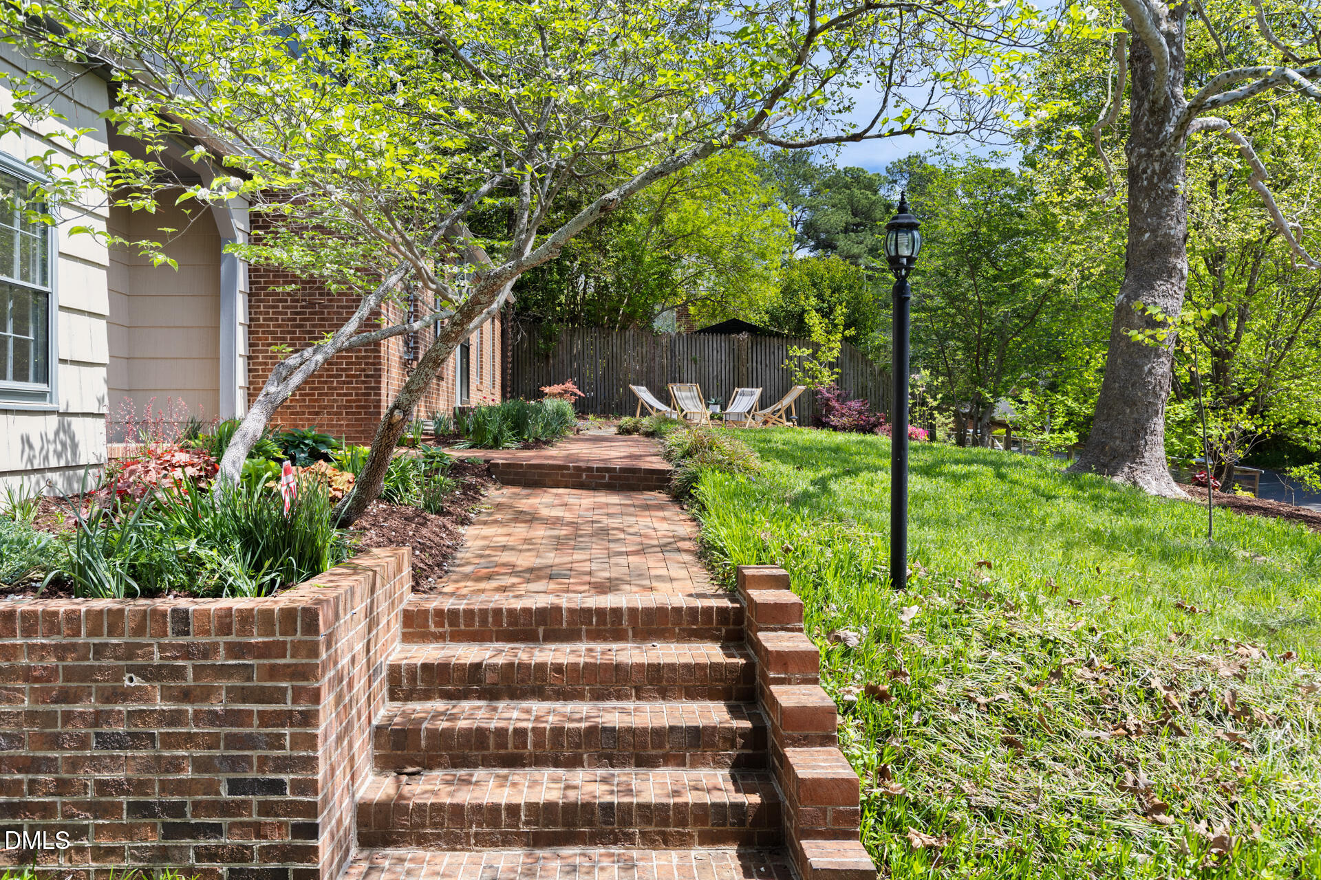 1706 Wallace Street Durham, NC 27707 - Photo 8 of 55 a front view of a house with a yard