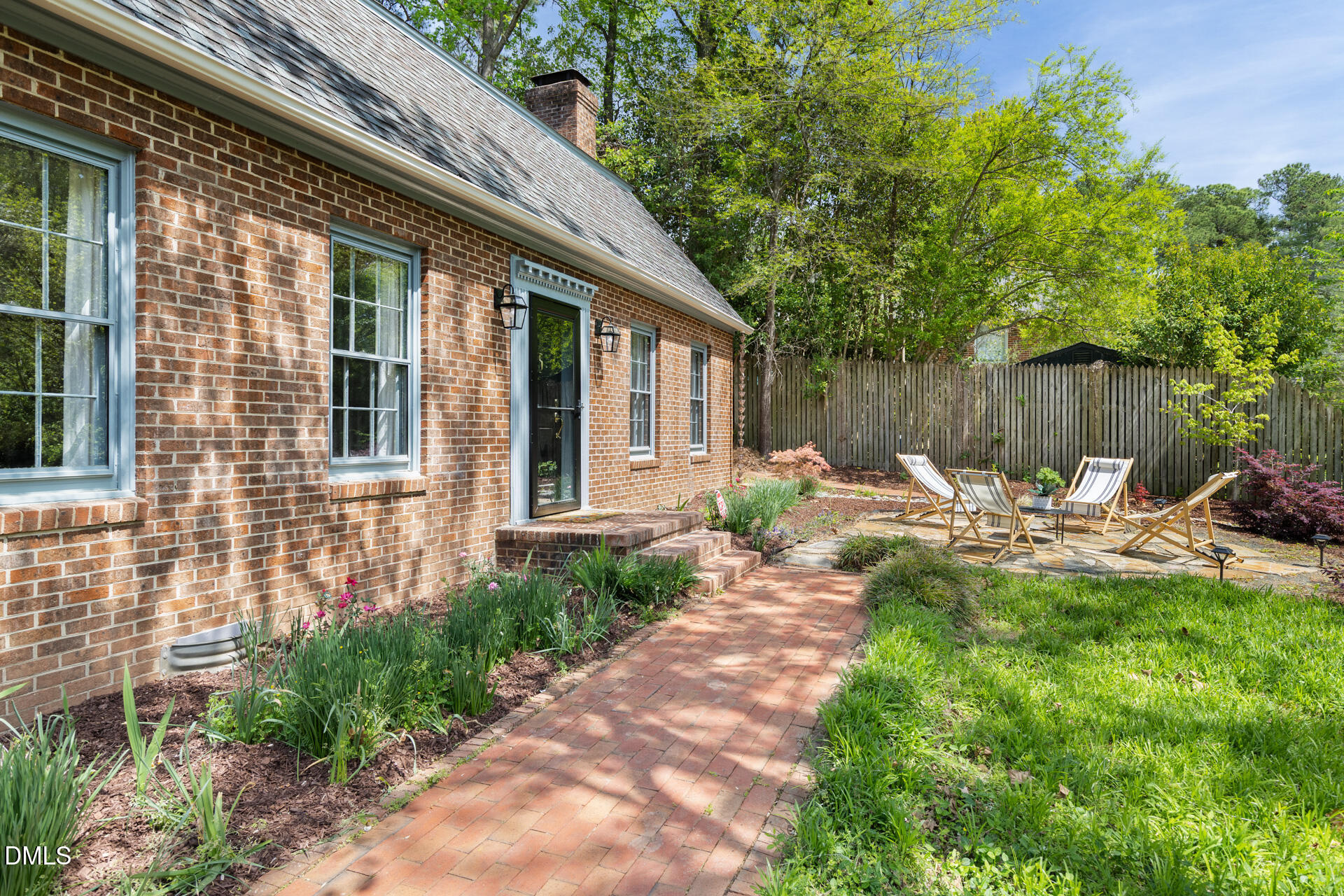 1706 Wallace Street Durham, NC 27707 - Photo 9 of 55 a view of a backyard with sitting area