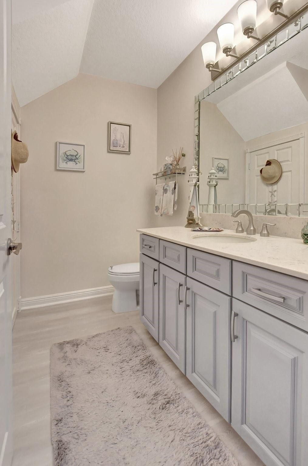 8316 Northwest 9th Avenue Boca Raton, FL 33487 - Photo 11 of 51 Half bath on first floor