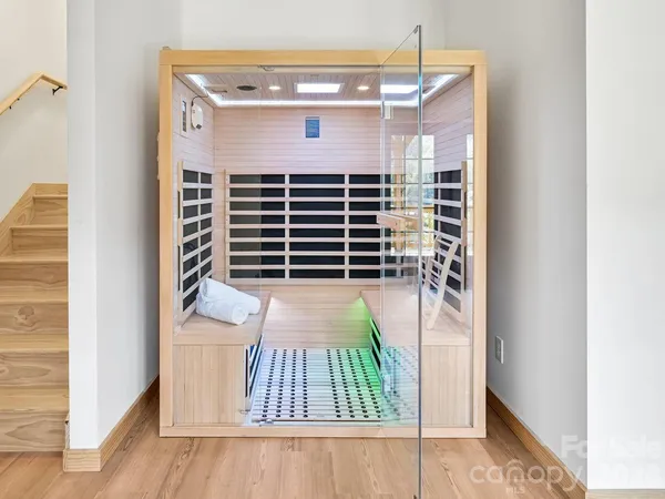 a view of livingroom with hardwood floor and ceiling fan