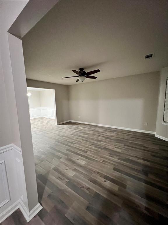 6064 Red Top Loop Union City, GA 30291 - Photo 3 of 10 a view of a room with wooden floor
