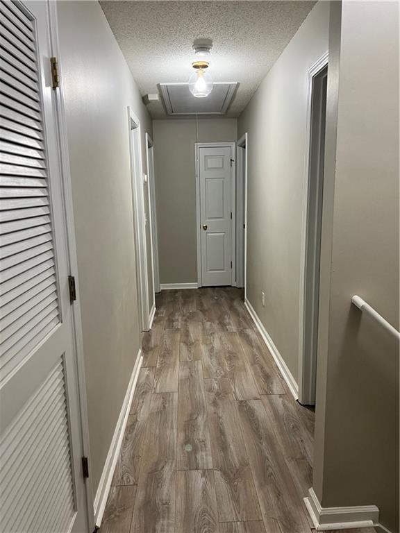 6064 Red Top Loop Union City, GA 30291 - Photo 6 of 10 a view of hallway with wooden floor
