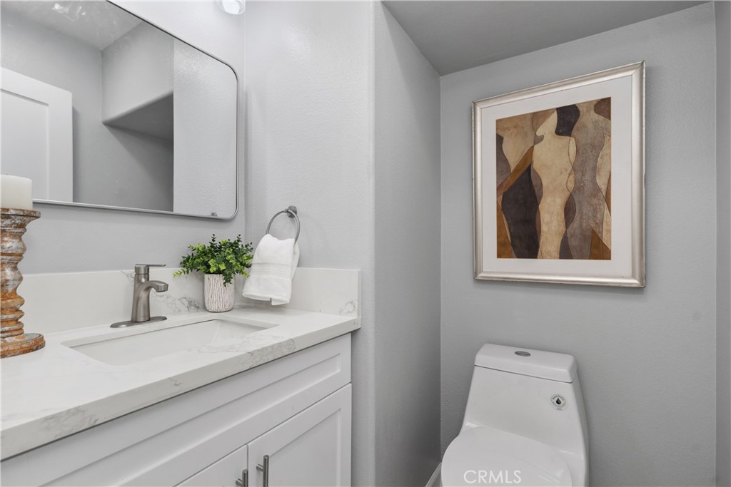 17 Nopalitos Way Aliso Viejo, CA 92656 - Photo 14 of 37 a bathroom with a sink and a mirror